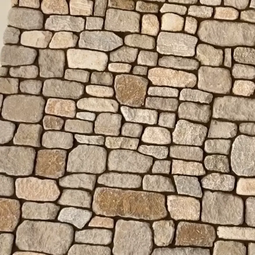 Natural tan and gold stone-veneer wall handcrafted by MCG Top Masonry in Southern California
